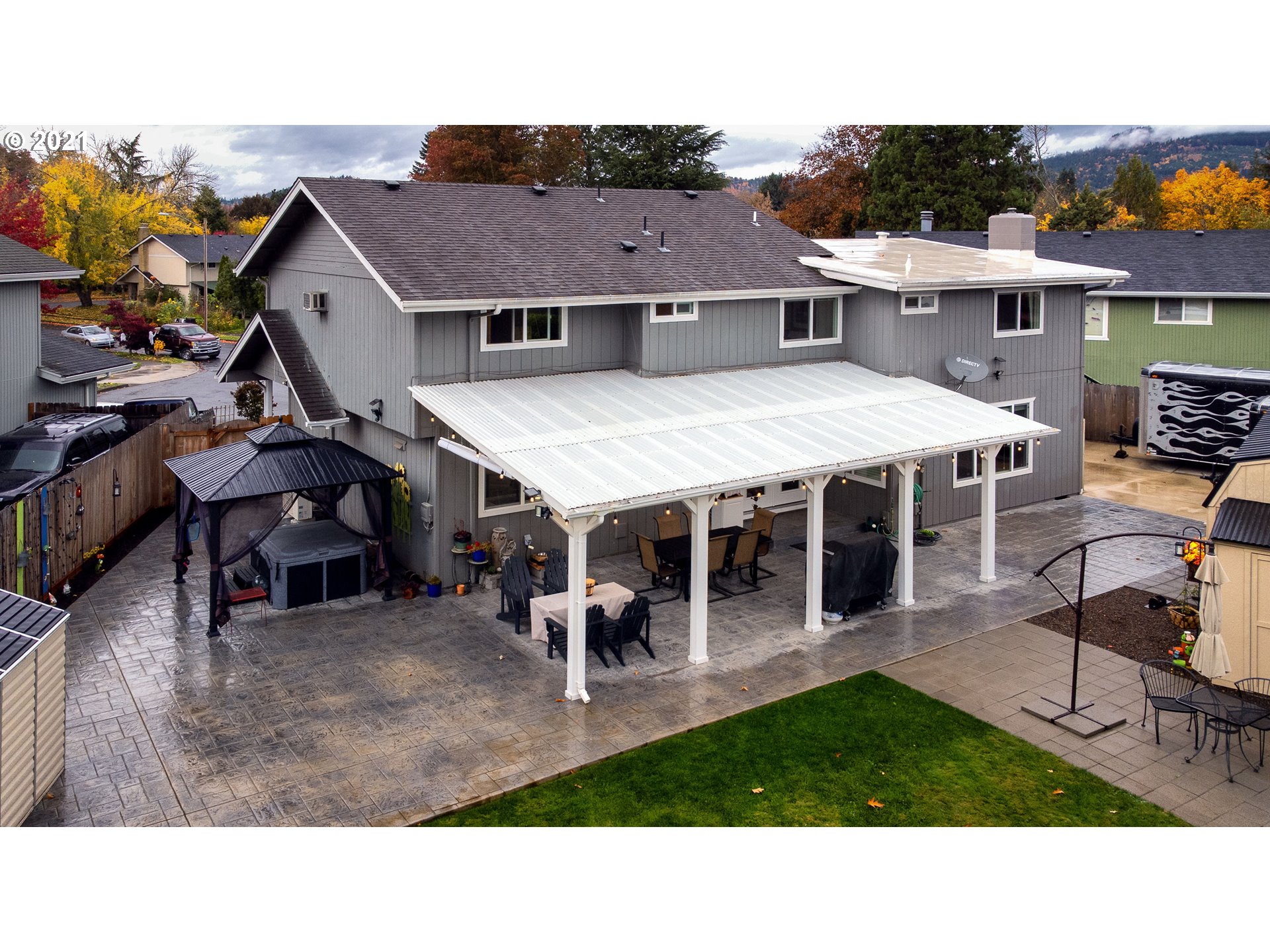 497 71st Street Springfield, OR 97478 - Photo 29 of 32 a view of a house with wooden floor and outdoor seating