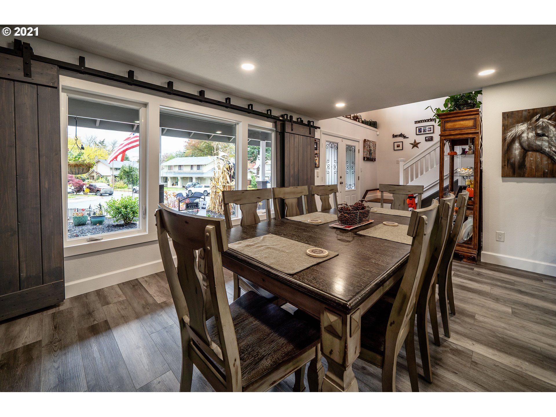 497 71st Street Springfield, OR 97478 - Photo 5 of 32 a view of a dining room with furniture and wooden floor