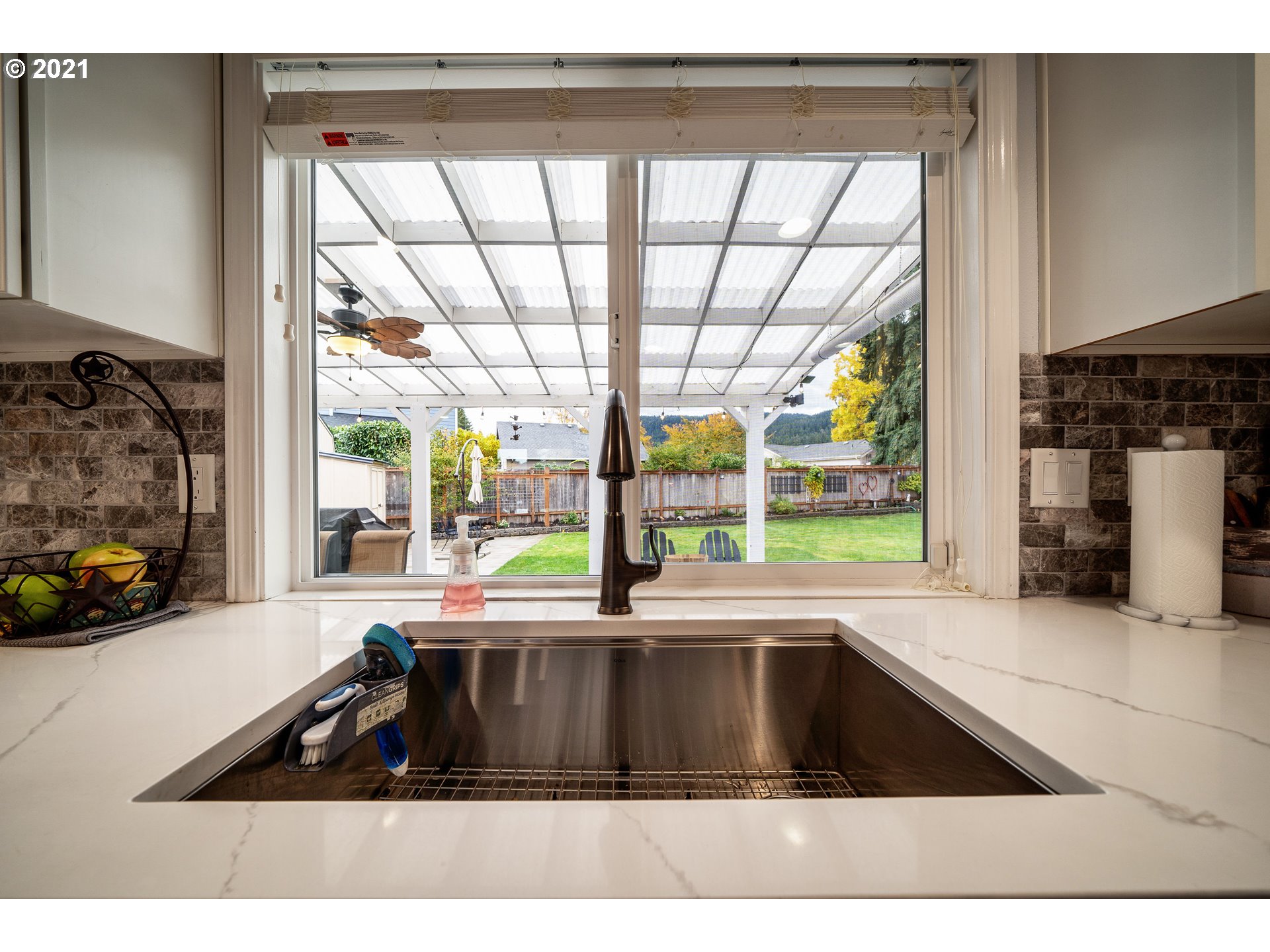 497 71st Street Springfield, OR 97478 - Photo 8 of 32 a kitchen with a large window