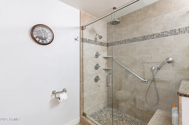 a view of a workspace with furniture and wooden floor