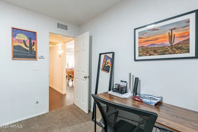 a view of a room with racks on the wall