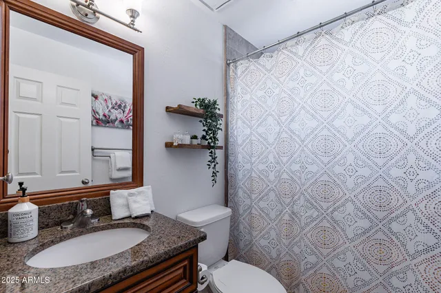 a view of a house with swimming pool and sitting area