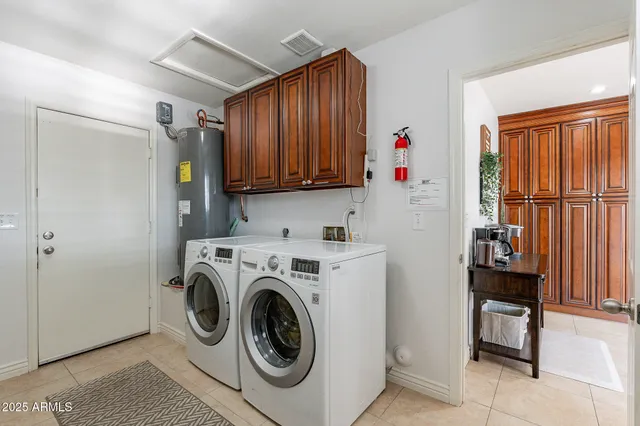 a view of a swimming pool with outdoor seating