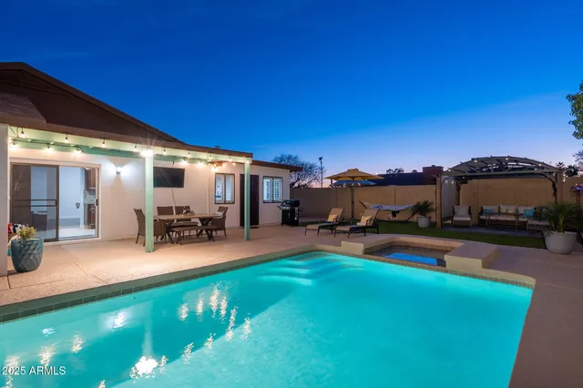 a view of a backyard with a patio
