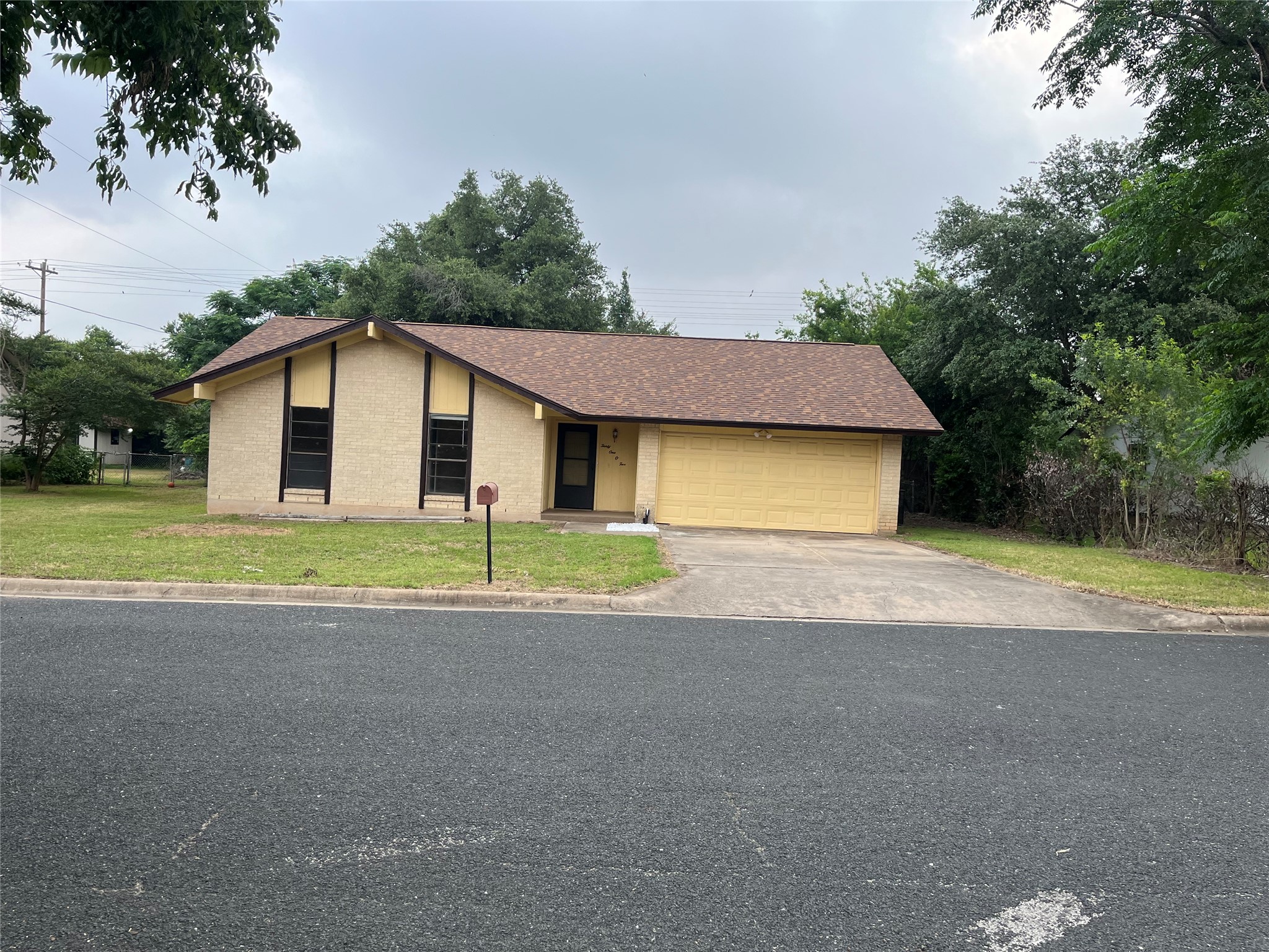 3105 Valley Pike Road Cedar Park, TX 78613 - Photo 1 of 1 a view of a house with a yard and garage