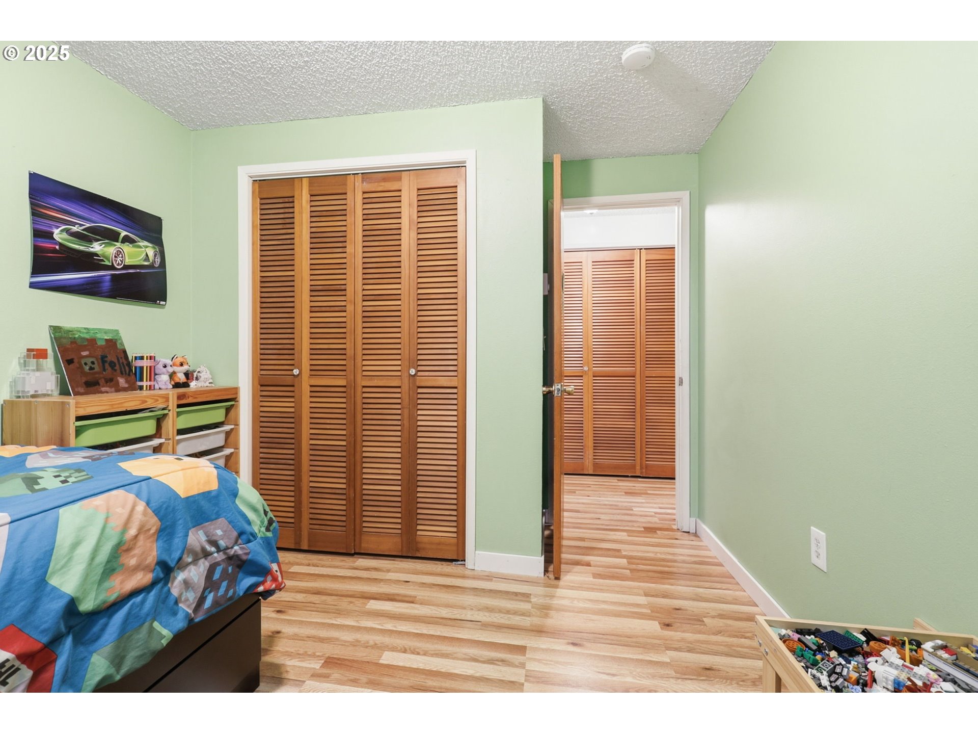 1123 Northwest Ash Street Camas, WA 98607 - Photo 18 of 26 a bedroom with furniture and a window