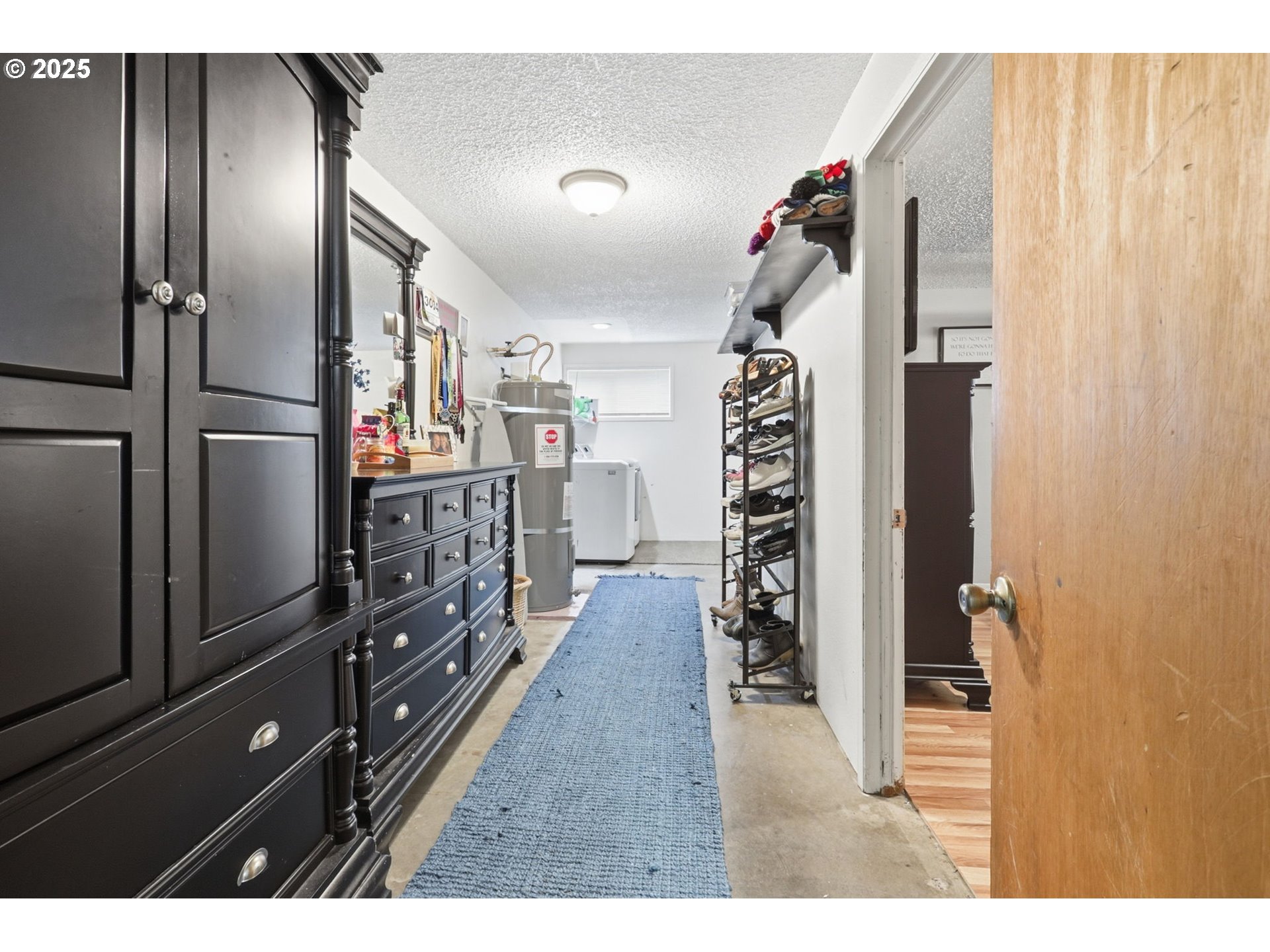 1123 Northwest Ash Street Camas, WA 98607 - Photo 19 of 26 a view of a hallway with wooden floor and windows