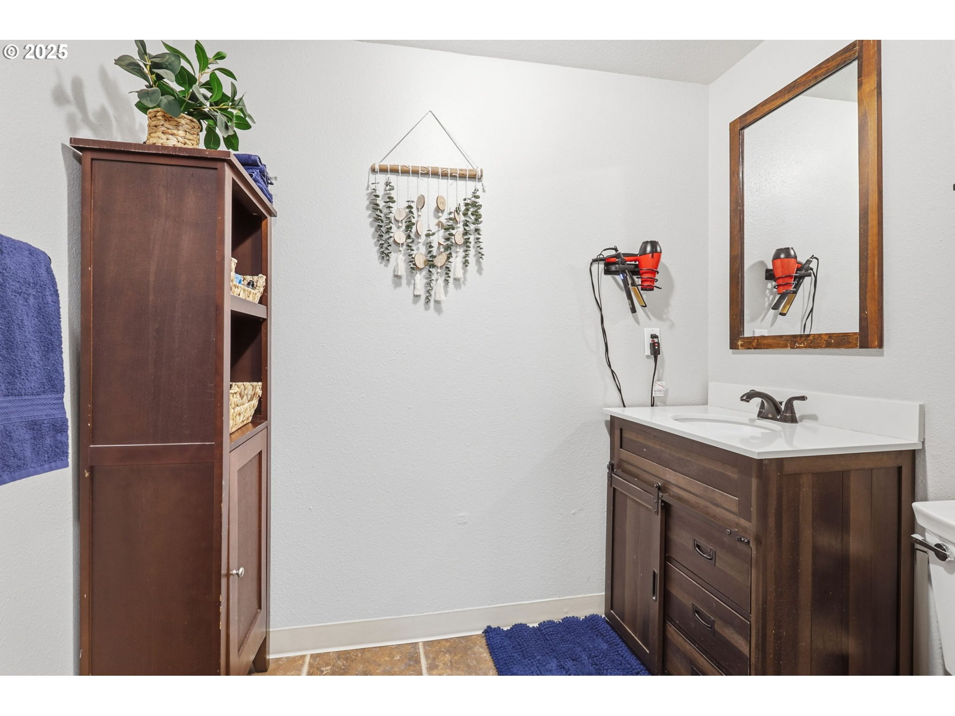 1123 Northwest Ash Street Camas, WA 98607 - Photo 23 of 26 a bathroom with a sink and a mirror