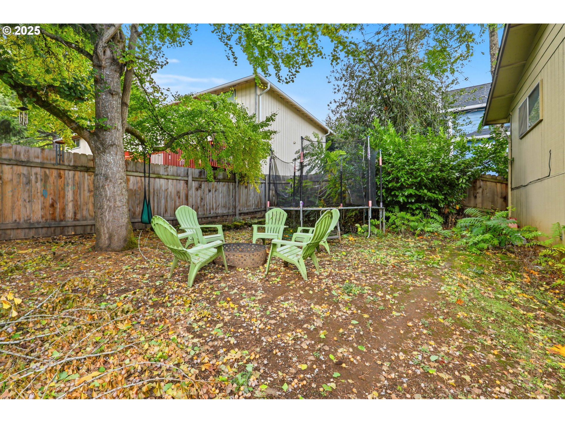1123 Northwest Ash Street Camas, WA 98607 - Photo 24 of 26 a view of a chair and table in backyard of the house