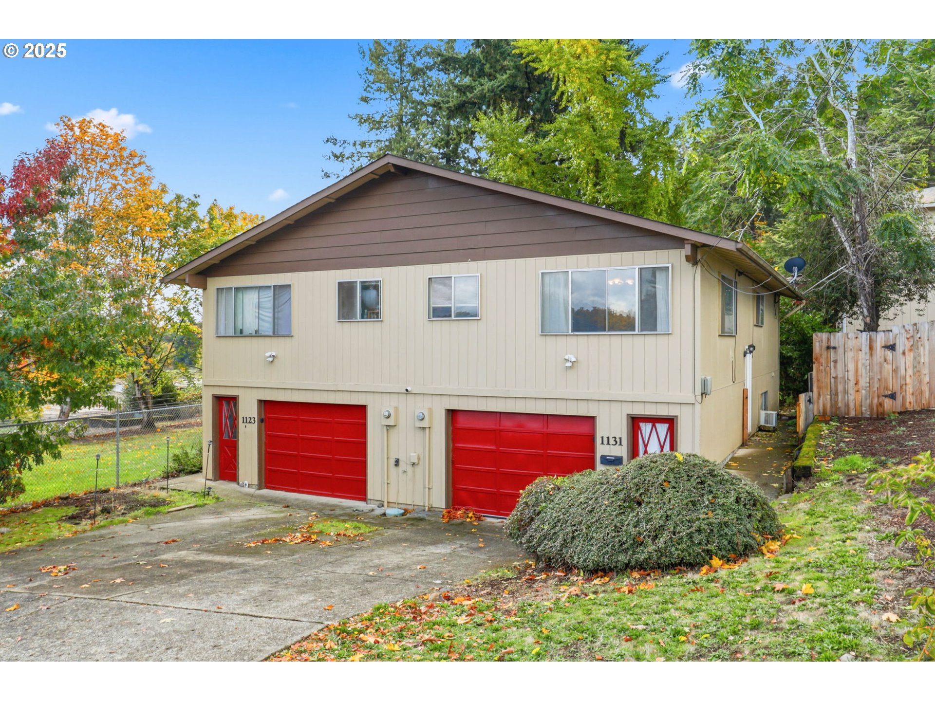 1123 Northwest Ash Street Camas, WA 98607 - Photo 26 of 26 a view of a house with a yard