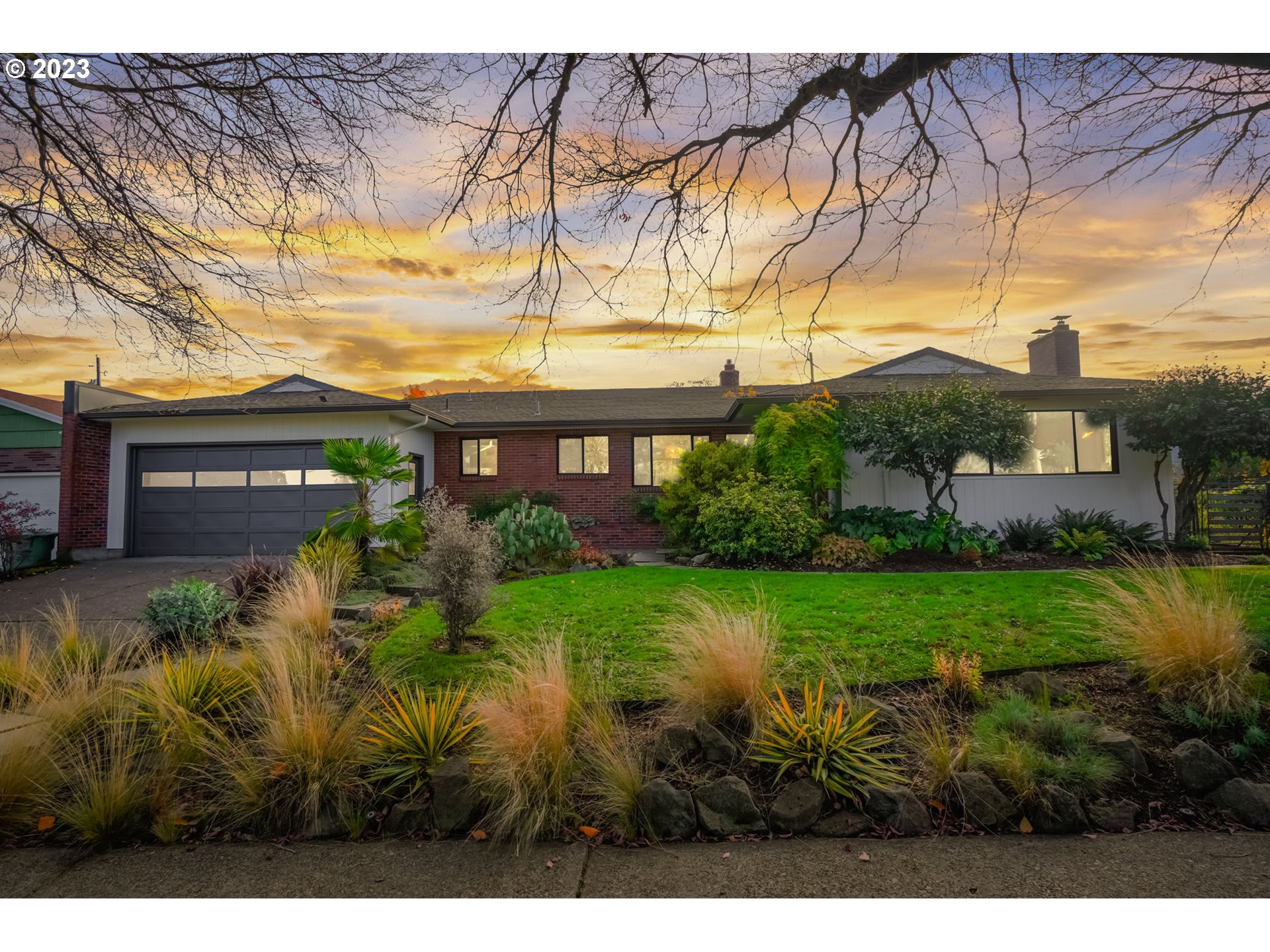 4020 Northeast Rosa Parks Way Portland, OR 97211 - Photo 1 of 48 a view of a house with a yard