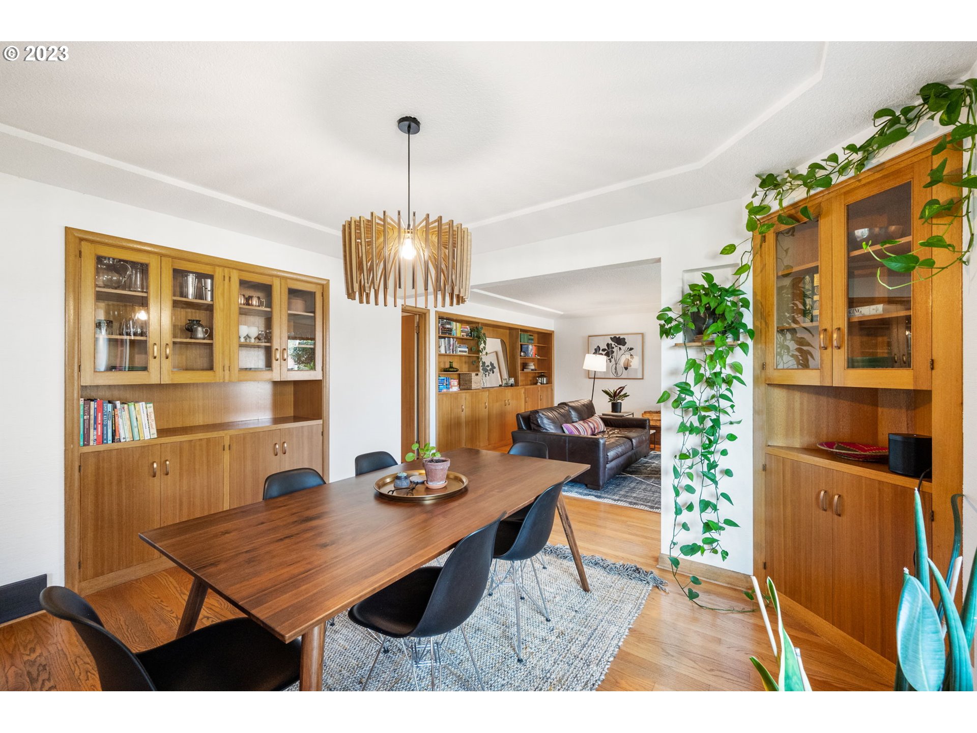 4020 Northeast Rosa Parks Way Portland, OR 97211 - Photo 12 of 48 a view of a dining room with furniture and chandelier