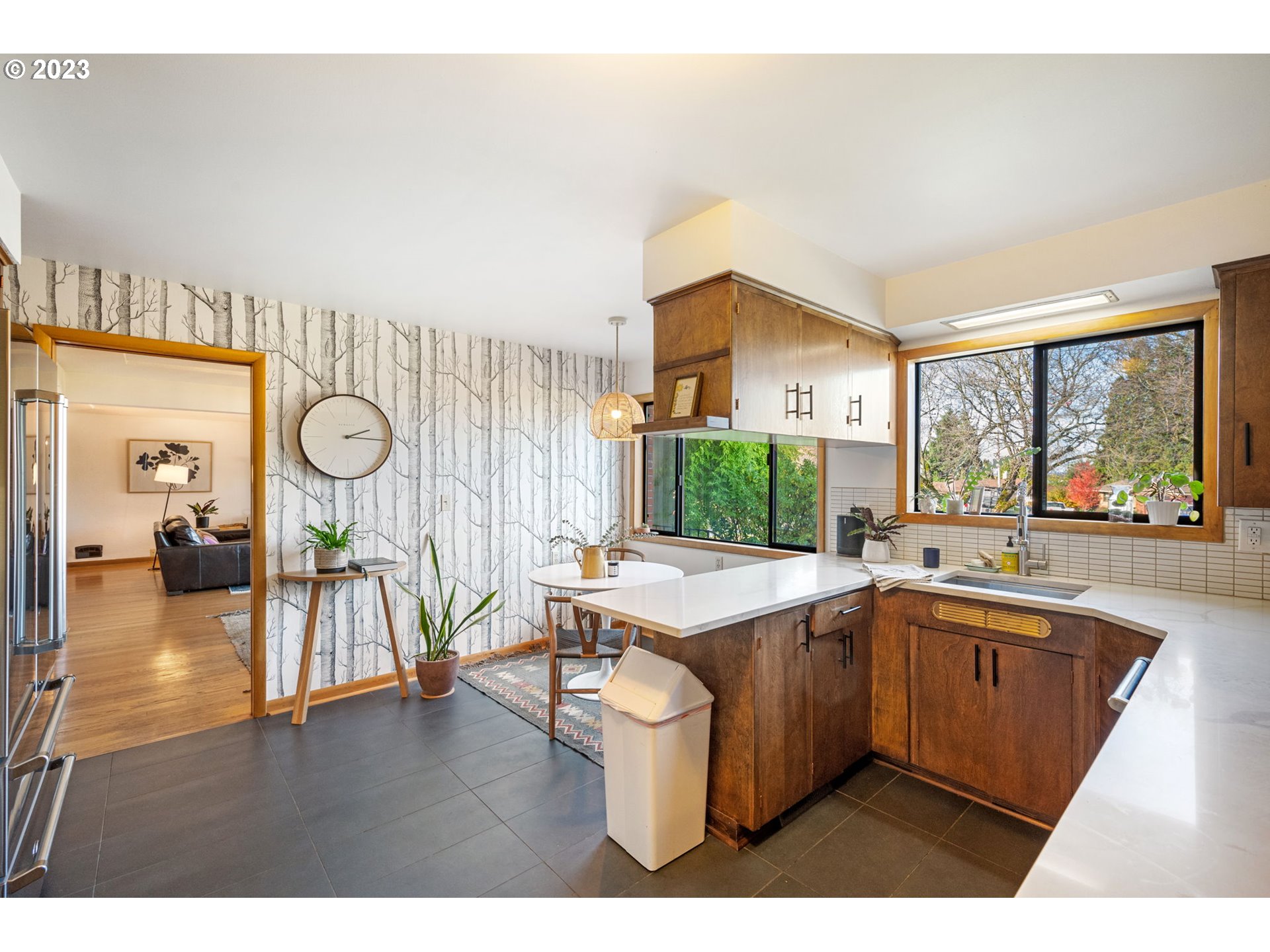 4020 Northeast Rosa Parks Way Portland, OR 97211 - Photo 14 of 48 a kitchen with a sink and cabinets