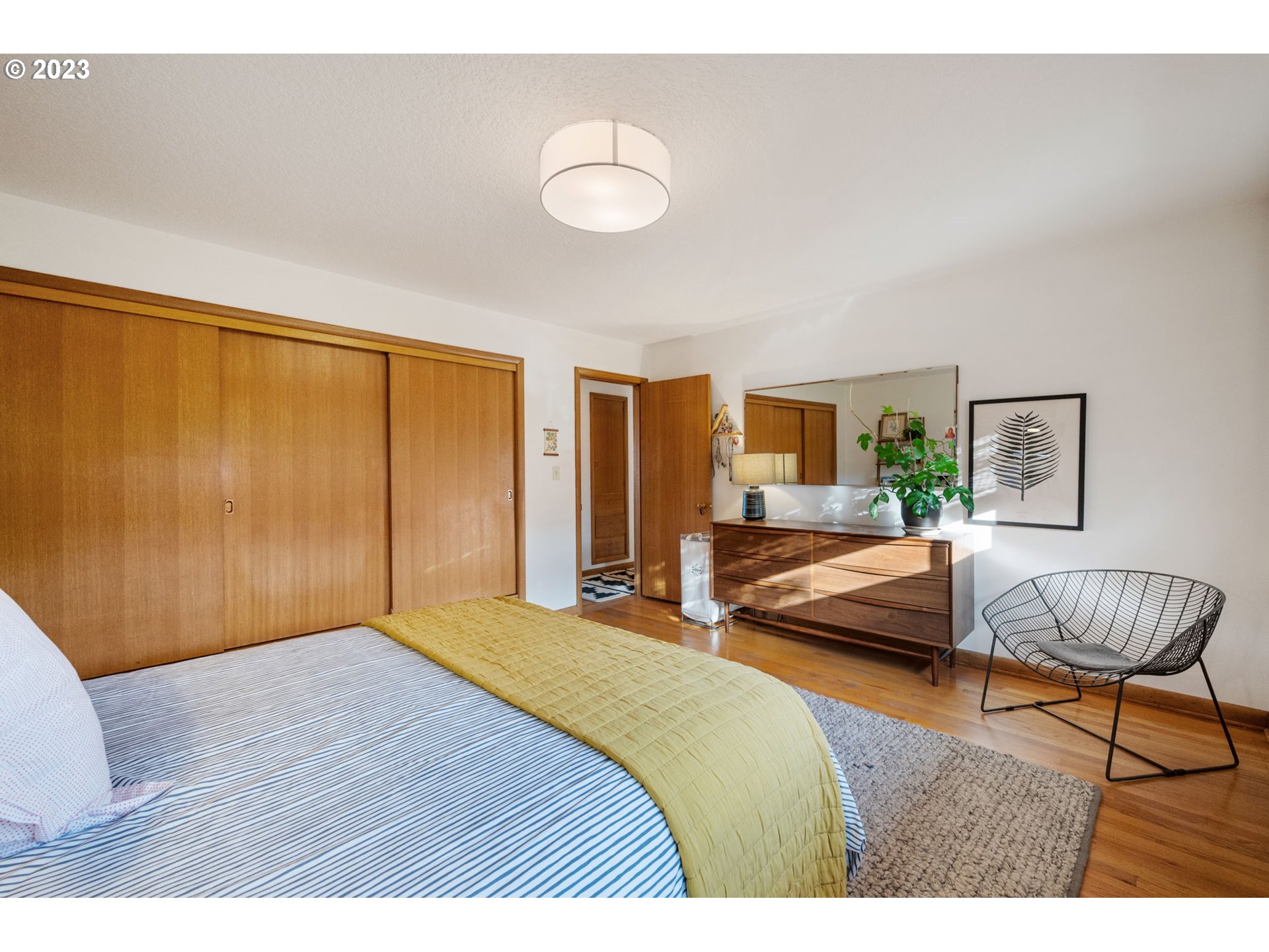 4020 Northeast Rosa Parks Way Portland, OR 97211 - Photo 23 of 48 a bedroom with a bed and a couch