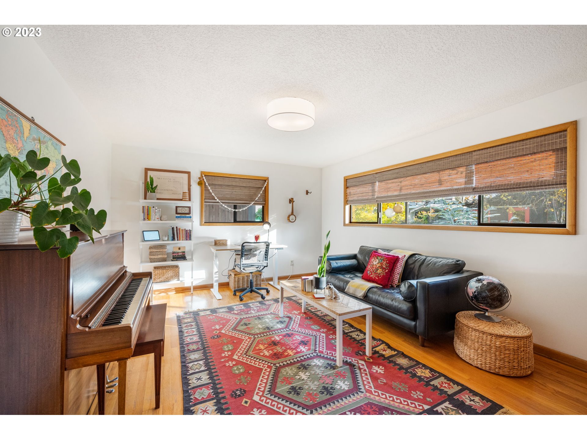 4020 Northeast Rosa Parks Way Portland, OR 97211 - Photo 24 of 48 a living room with furniture and a potted plant