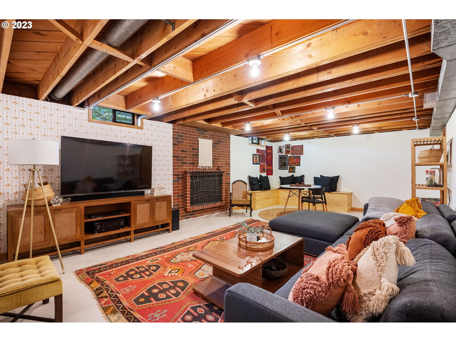 4020 Northeast Rosa Parks Way Portland, OR 97211 - Photo 28 of 48 a living room with furniture and a flat screen tv