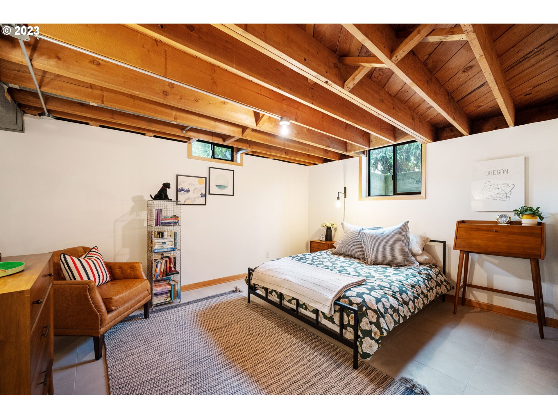 4020 Northeast Rosa Parks Way Portland, OR 97211 - Photo 31 of 48 a bedroom with a bed and a chair