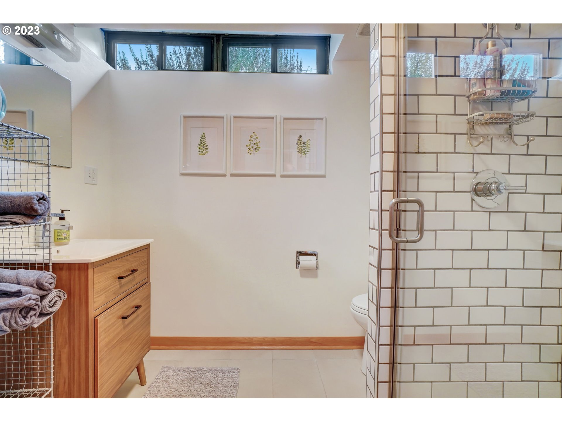 4020 Northeast Rosa Parks Way Portland, OR 97211 - Photo 33 of 48 a bathroom with a sink and a mirror