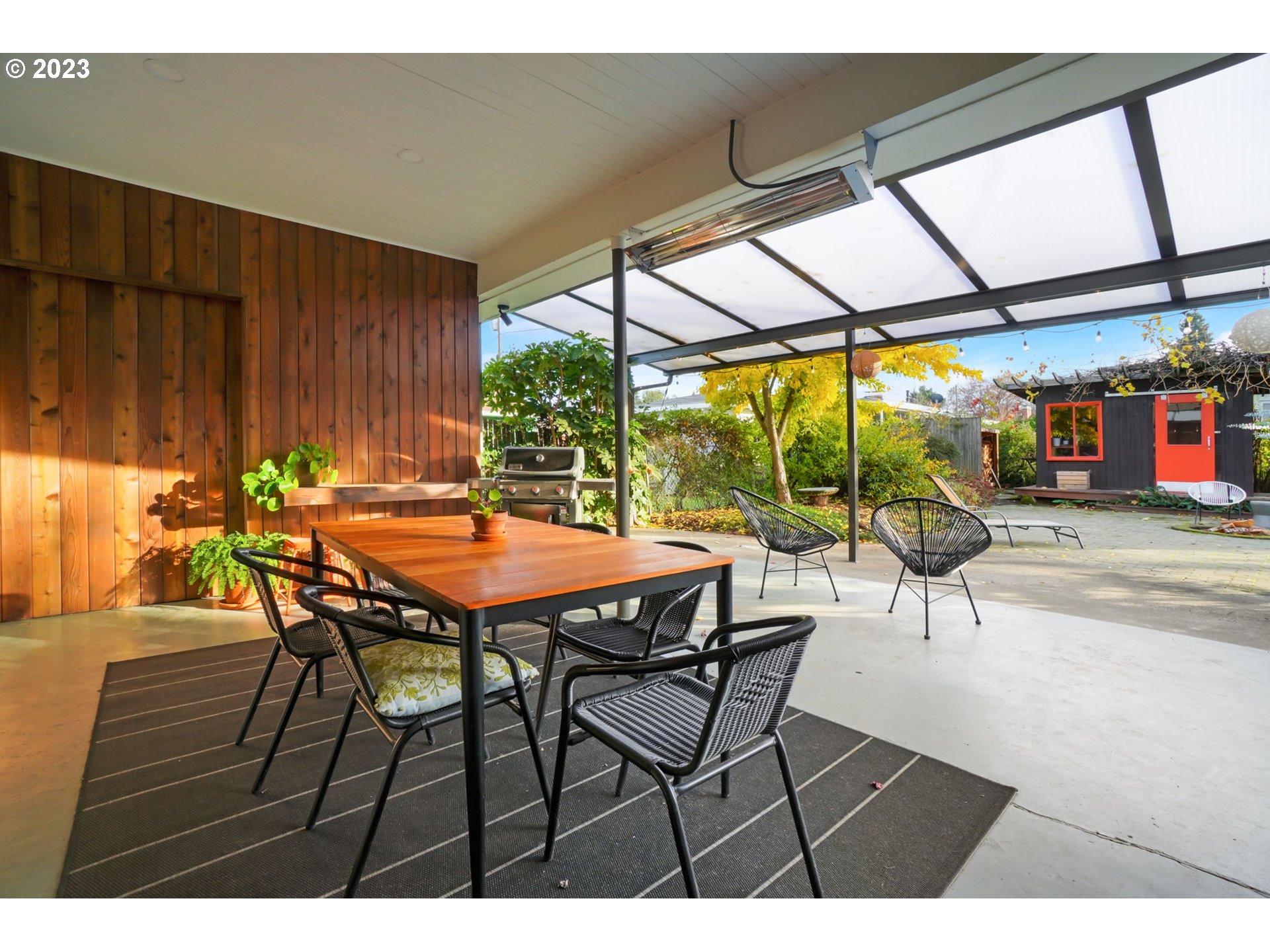 4020 Northeast Rosa Parks Way Portland, OR 97211 - Photo 36 of 48 a dining room with furniture and a floor to ceiling window