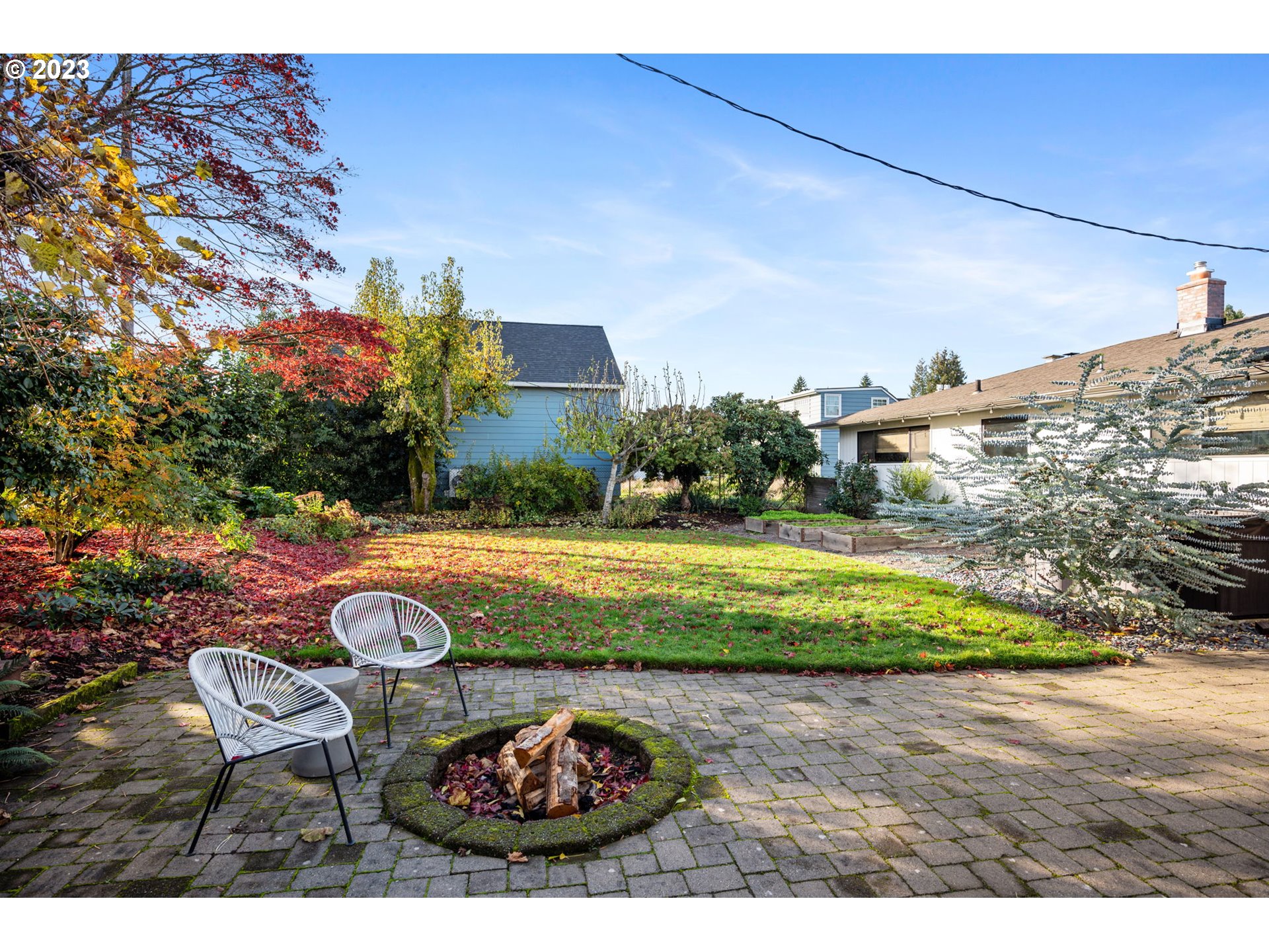 4020 Northeast Rosa Parks Way Portland, OR 97211 - Photo 41 of 48 a view of a backyard with table and chairs