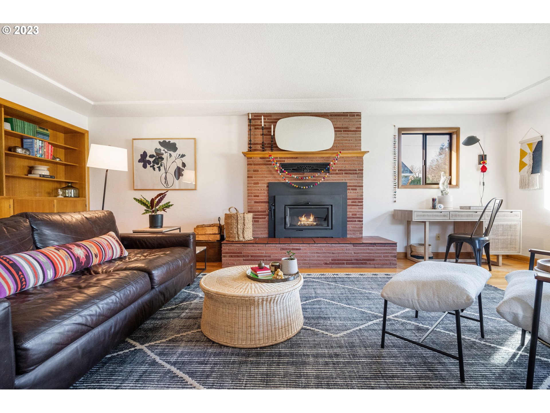 4020 Northeast Rosa Parks Way Portland, OR 97211 - Photo 8 of 48 a living room with furniture and a fireplace