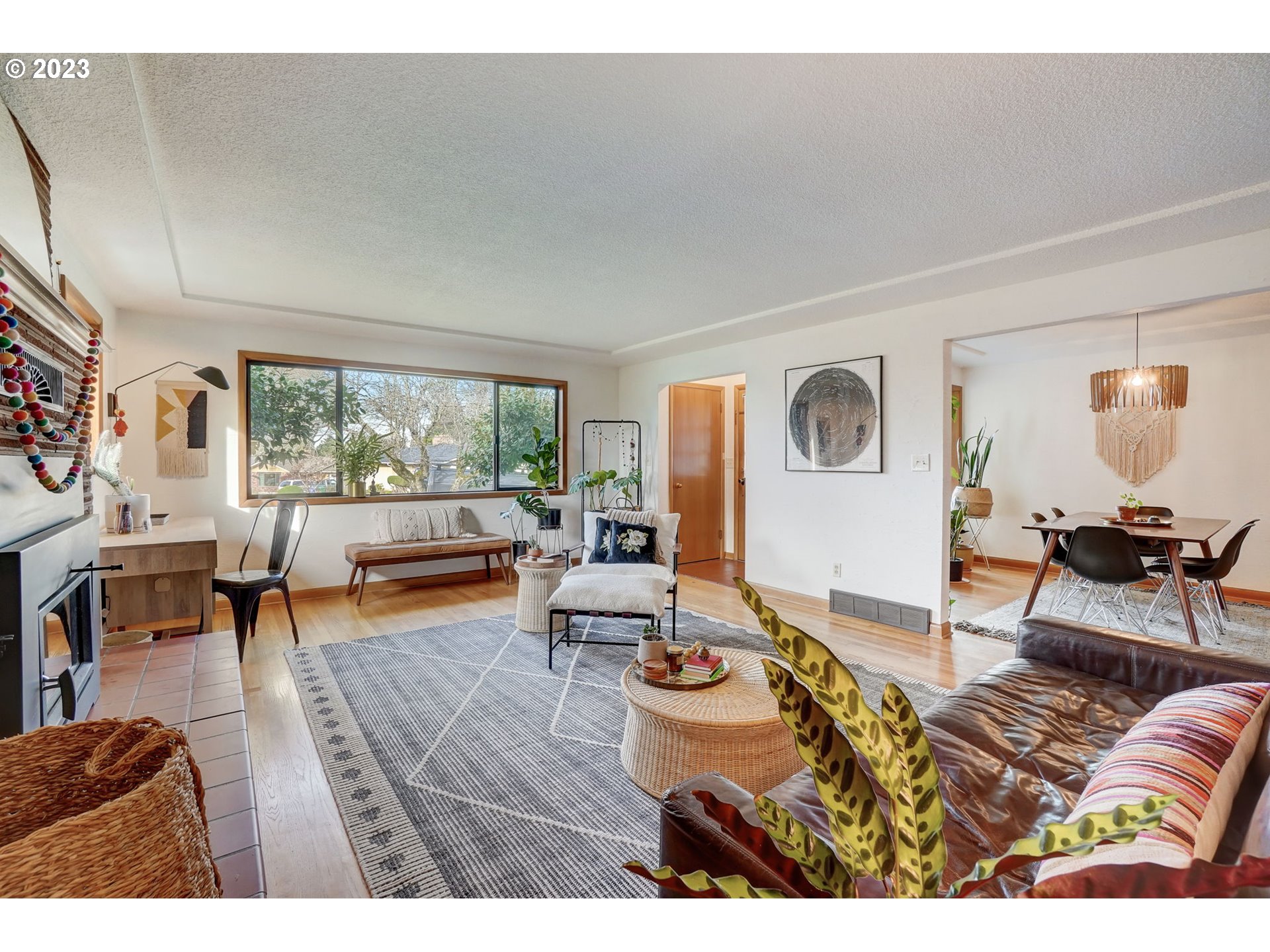 4020 Northeast Rosa Parks Way Portland, OR 97211 - Photo 10 of 48 a living room with furniture and a large window