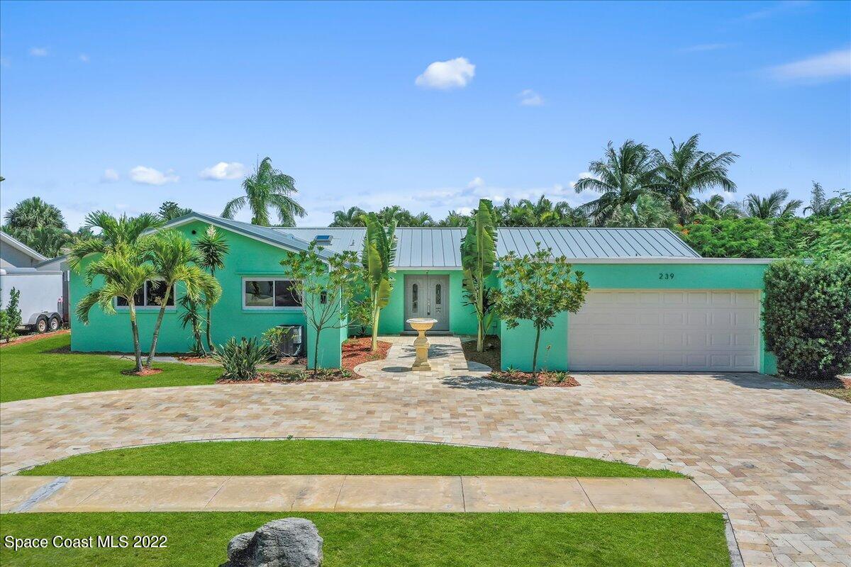 239 Sand Pine Road Indialantic, FL 32903 - Photo 1 of 74 front of home