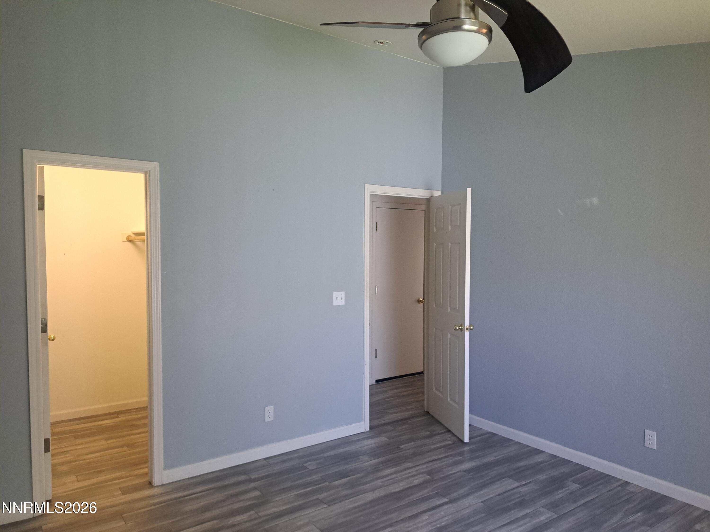 3106 May Rose Circle Reno, NV 89502 - Photo 12 of 22 Primary bedroom hall and closet doors