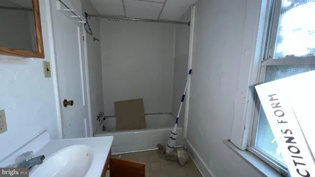 a bathroom with a bathtub