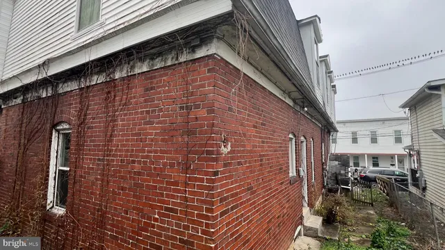 a brick building with a large window