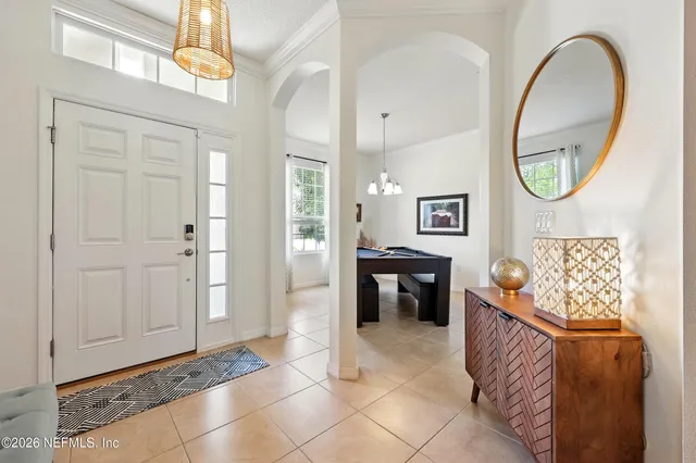 a view of an entryway with sitting area