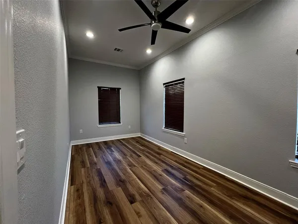 a bathroom with a shower and a toilet
