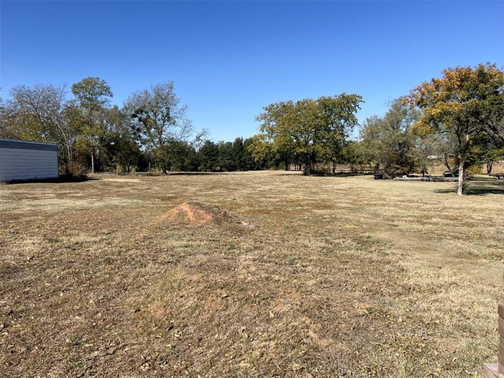 724 Franklin Street Bellevue, TX 76228 - Photo 7 of 32 a view of an ocean and beach