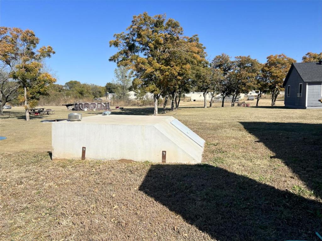 724 Franklin Street Bellevue, TX 76228 - Photo 9 of 32 a view of outdoor space with ocean view