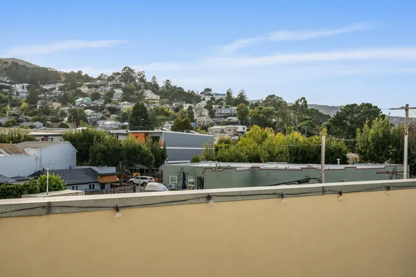 a view of a terrace with city view