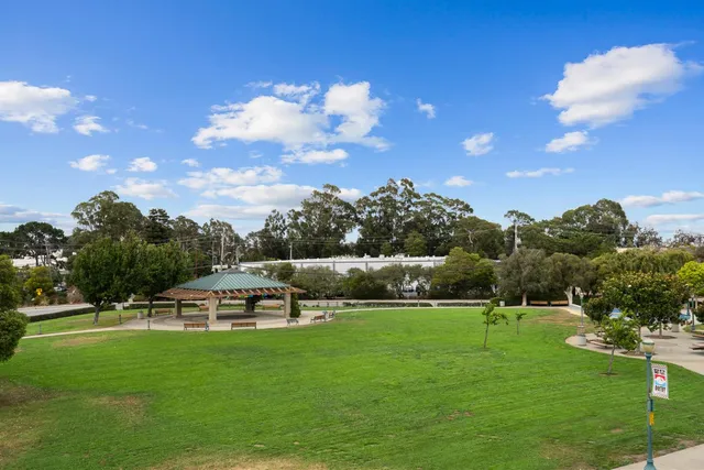 an aerial view of a house with yard swimming pool and outdoor seating