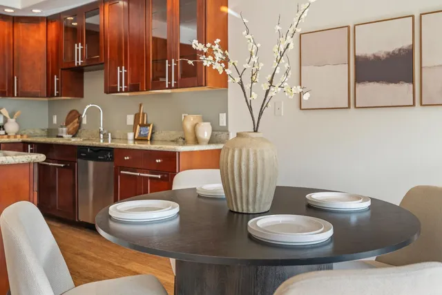 a bathroom with a toilet a sink and a mirror