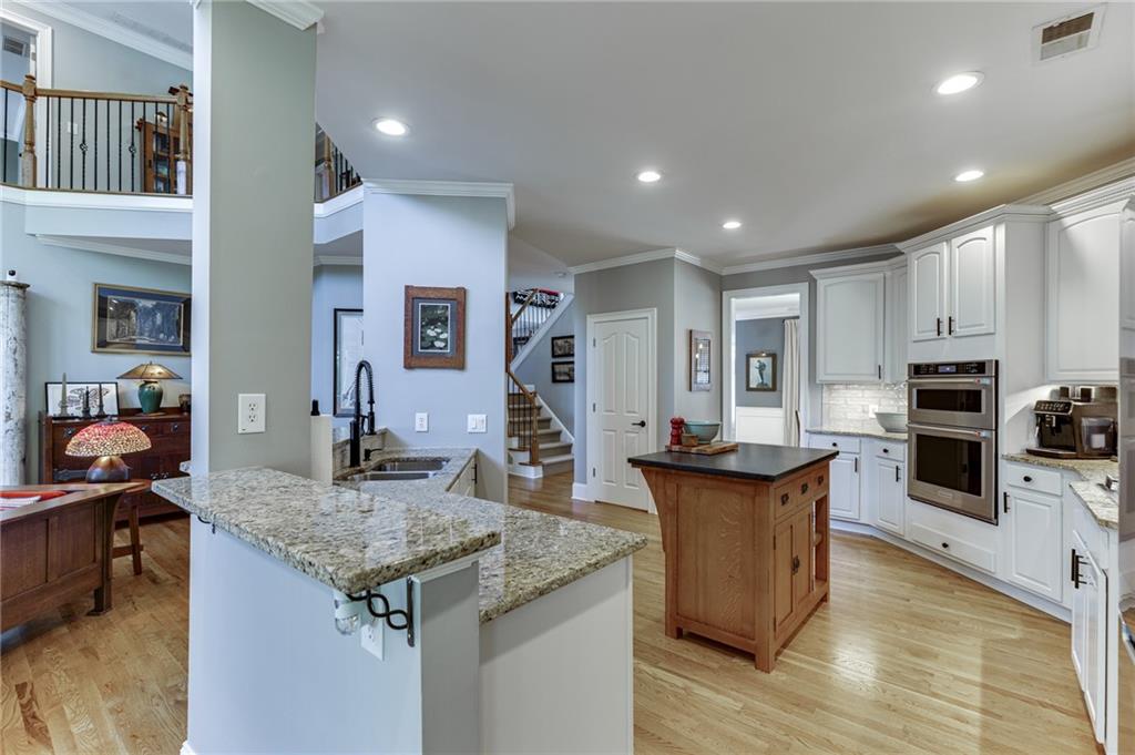 2758 Pathview Drive Dacula, GA 30019 - Photo 12 of 48 a kitchen with sink and cabinets