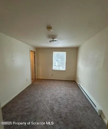 an empty room with a natural light