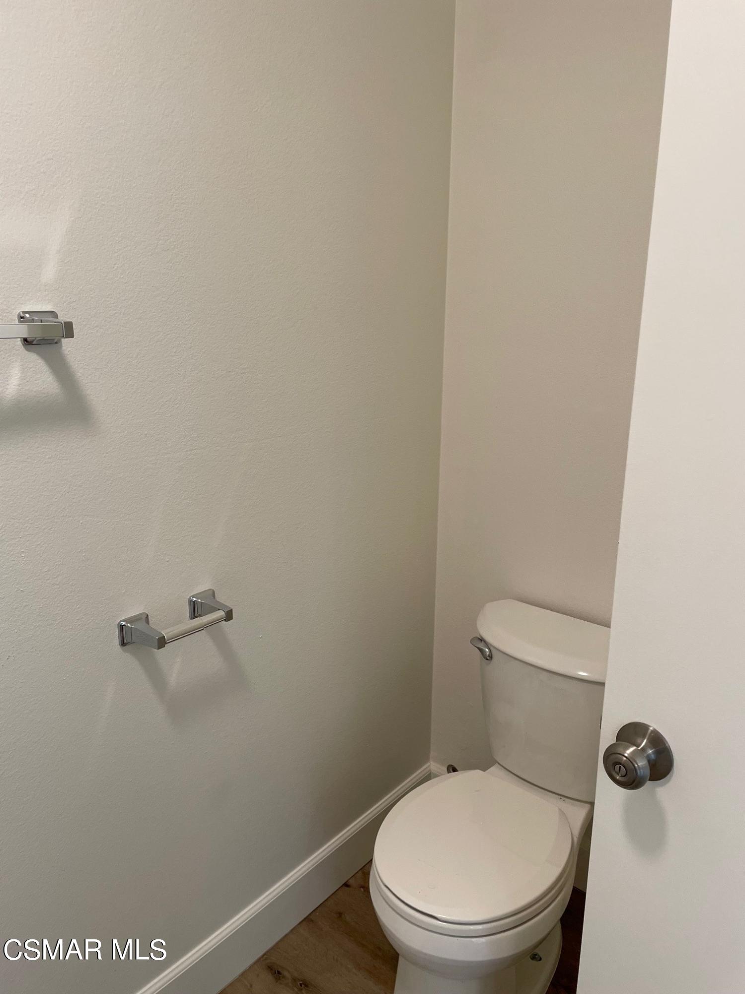 1760 Sinaloa Road, Unit 265 Simi Valley, CA 93065 - Photo 28 of 39 a white toilet sitting next to a shower