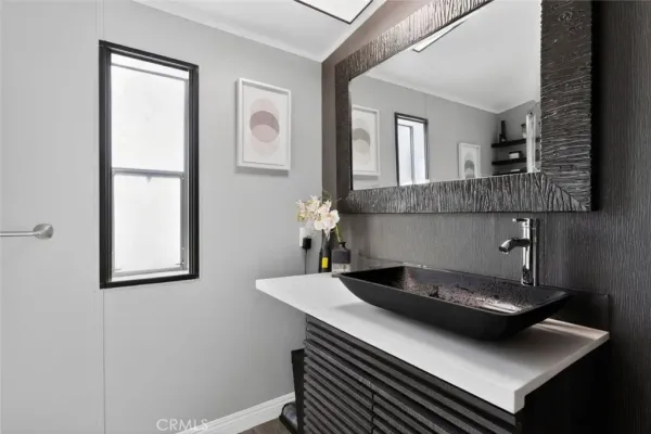 a kitchen with a sink and a window