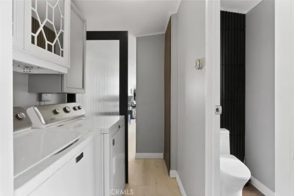 a kitchen with a refrigerator sink and stove