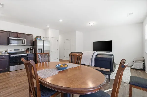 a view of a dining room with furniture