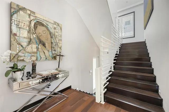 a view of entryway with wooden floor