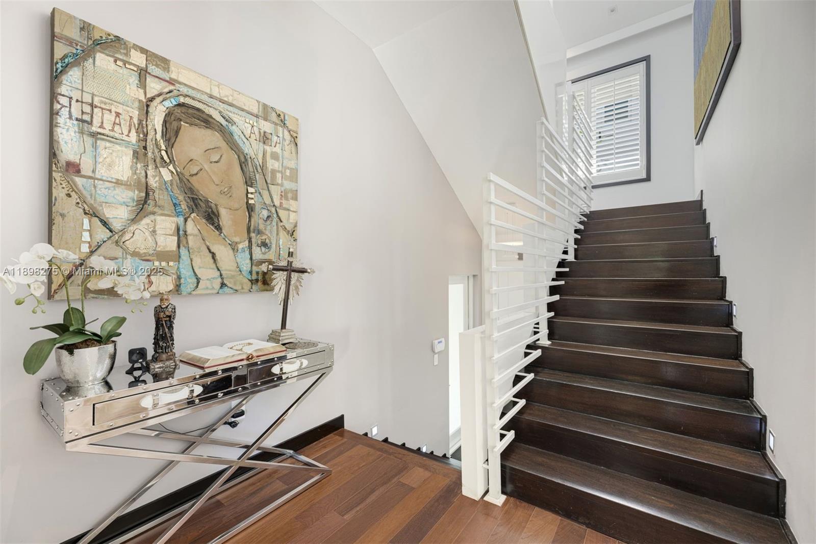765 Allendale Road Key Biscayne, FL 33149 - Photo 9 of 29 a view of entryway with wooden floor
