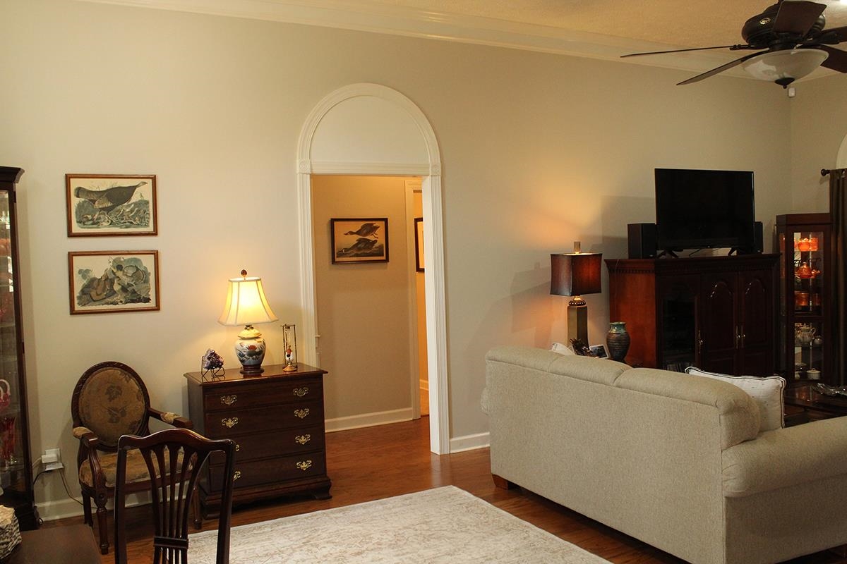 175 Windale Drive Jackson, TN 38305 - Photo 14 of 25 a living room with furniture and wooden floor