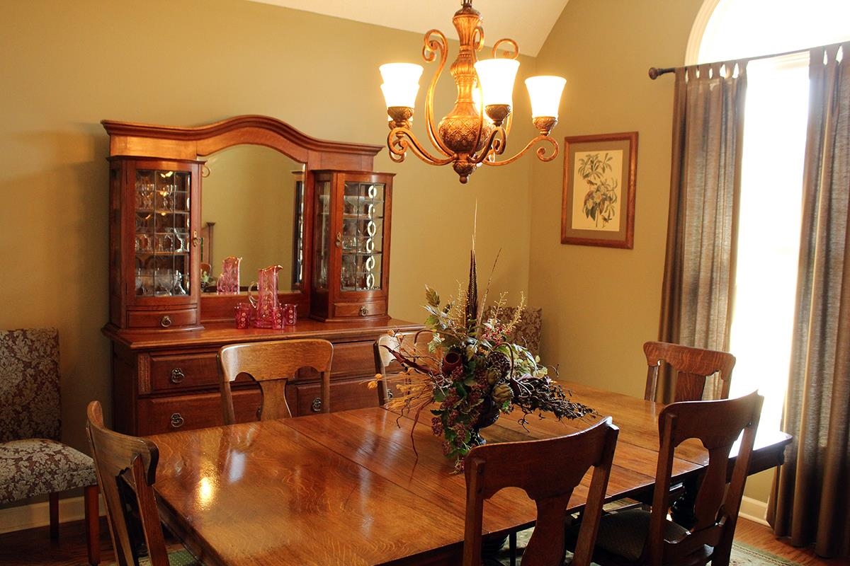 175 Windale Drive Jackson, TN 38305 - Photo 22 of 25 a view of a dining room with furniture and chandelier