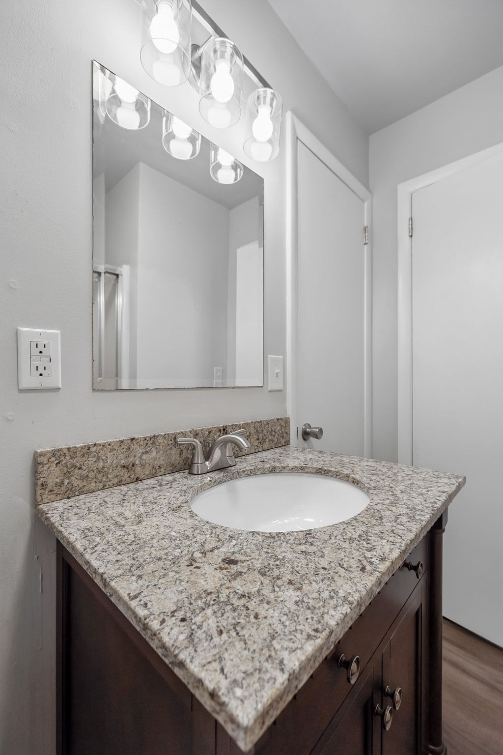 1003 Twin Creek Road Charlotte, TN 37036 - Photo 26 of 37 a bathroom with a granite countertop sink and a mirror