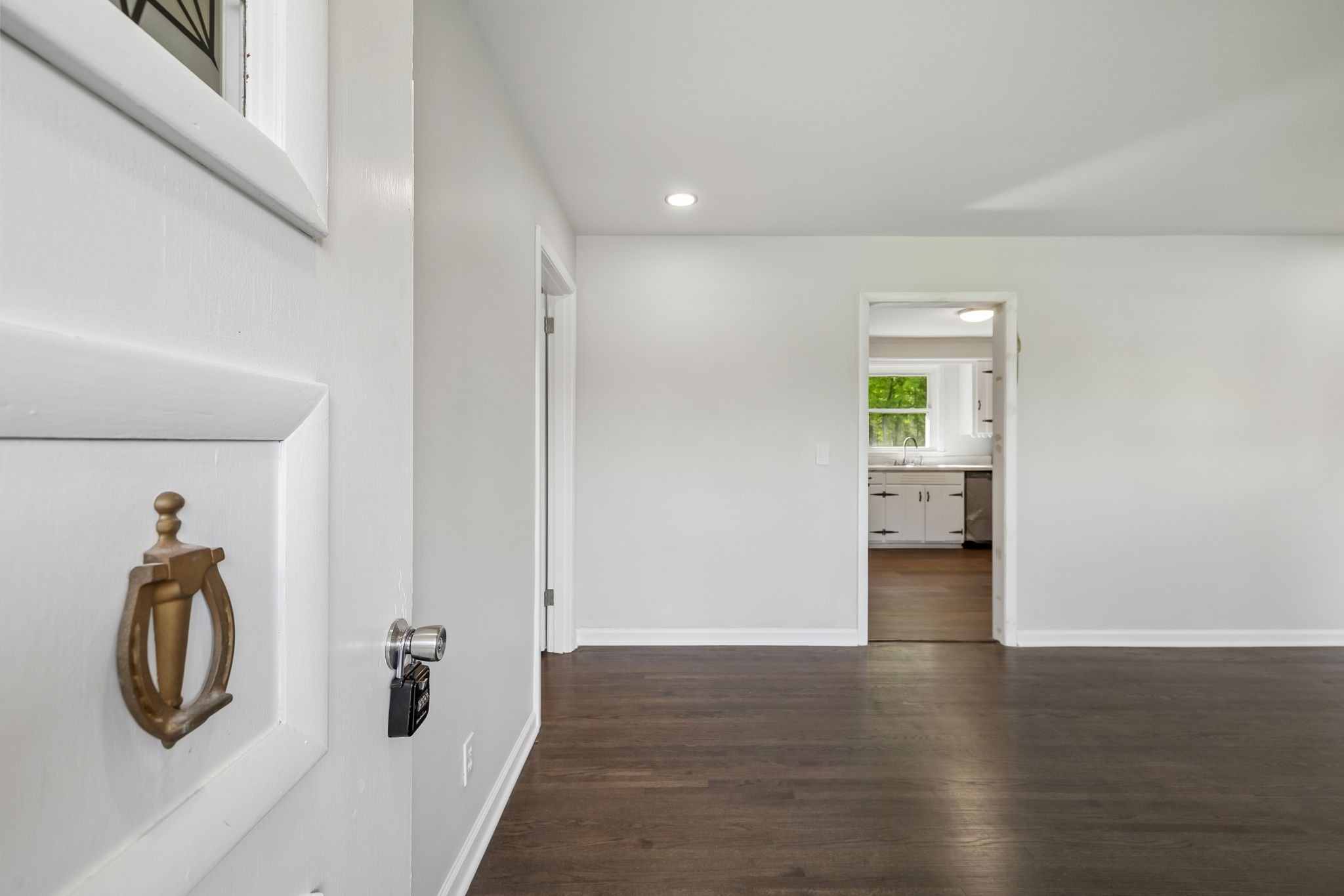1003 Twin Creek Road Charlotte, TN 37036 - Photo 3 of 37 a view of a hallway with wooden floor and closet