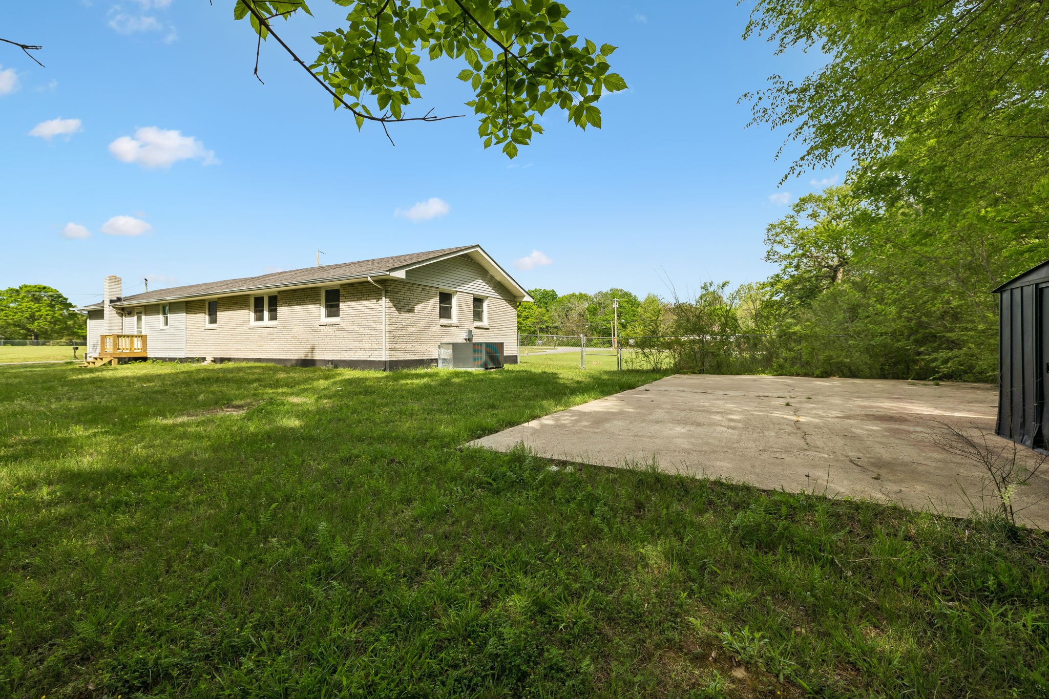 1003 Twin Creek Road Charlotte, TN 37036 - Photo 35 of 37 a view of a house with a yard